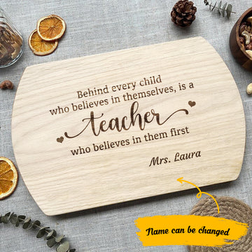 Behind Every Child Who Believes in Themselves is a Teacher  - Personalized Hardwood Oval Cutting Board