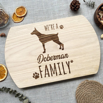 We are a Doberman family - Hardwood Oval Cutting Board