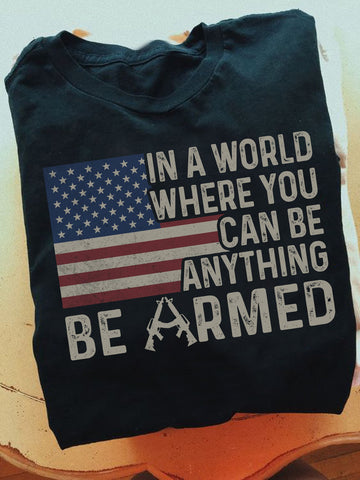 In A World Where You Can Be Anything Be Armed - Standard T-shirt